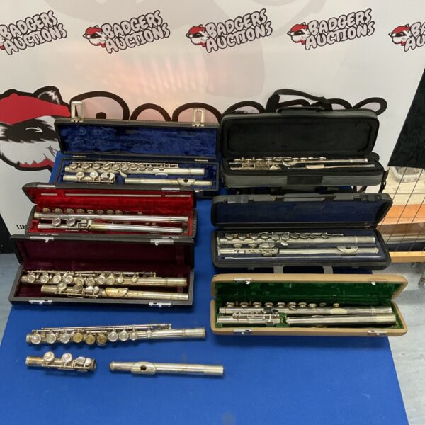 Vintage flute lot with cases, including a sapphire instrument.