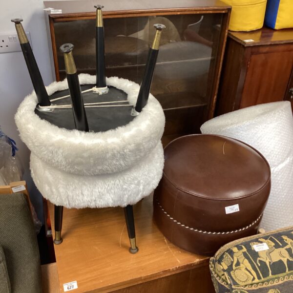 Vintage footstool lot with leather and fabric covered designs.