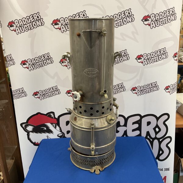 Vintage G Albessard percolator drinks dispenser in full view.
