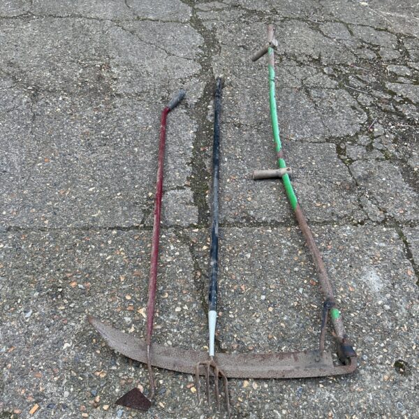 Vintage scythe and hoes, antique garden tools for sale.