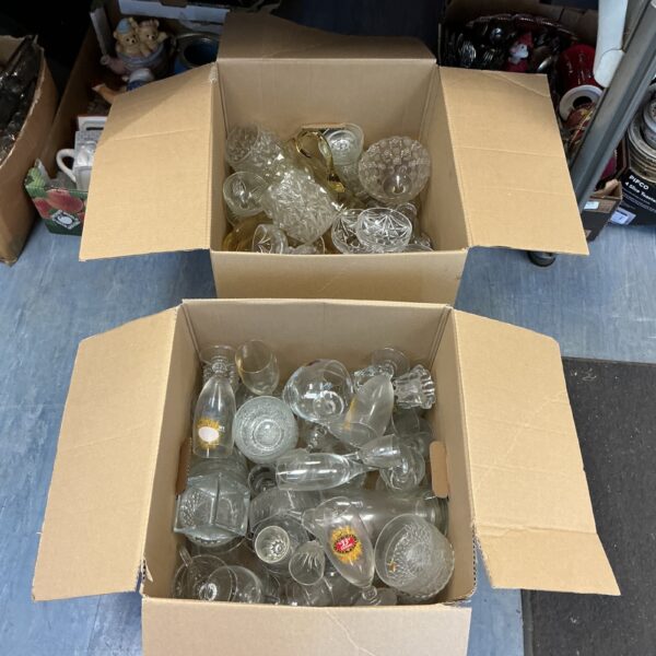 Vintage glassware lot with assorted beer and drinking glasses.