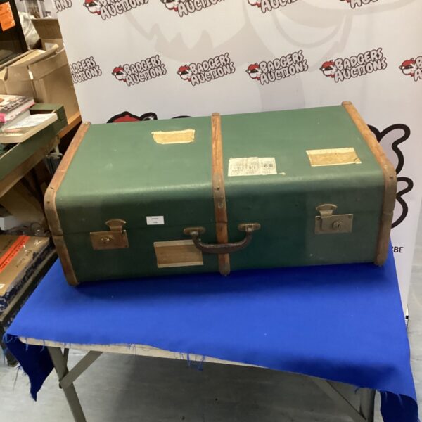 Vintage green travel case with G.W.R. stamps, a collectible item.