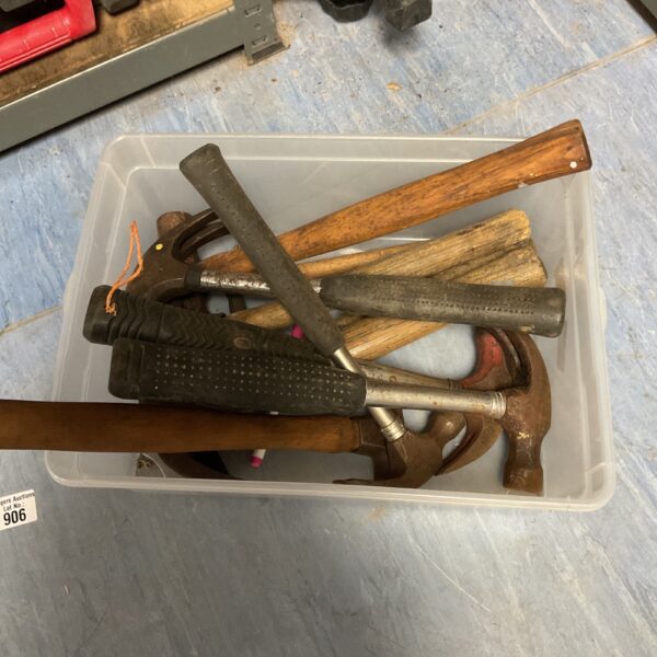 Vintage hammer lot with various tools for carpentry and repair.