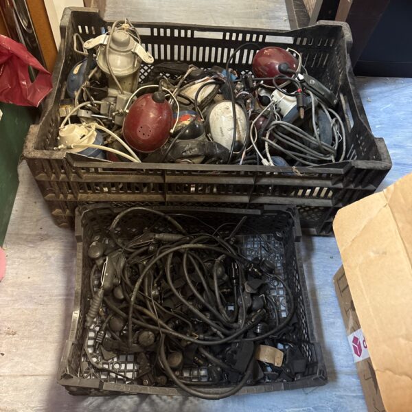 Lot of vintage headphones and throat mikes for collectors.