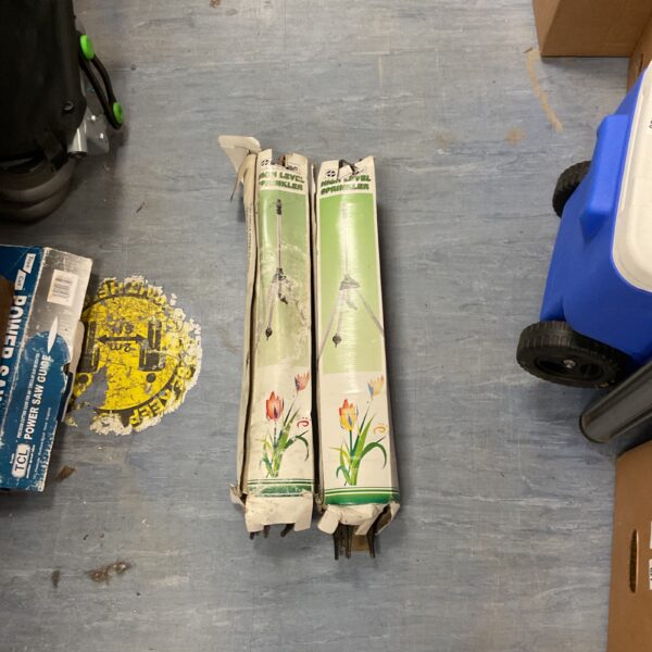 Vintage high level sprinklers with floral design for garden irrigation.