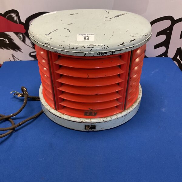 Side view of a vintage HMV 230v electric heater.