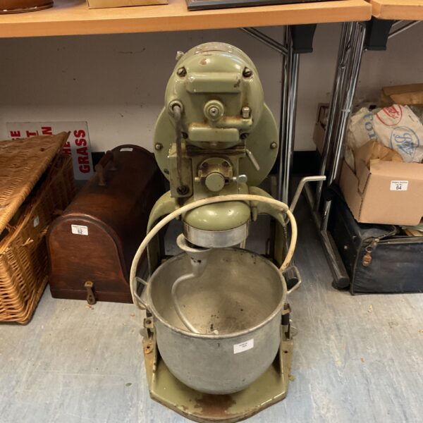 Front view of a vintage Hobart industrial kitchen mixer.
