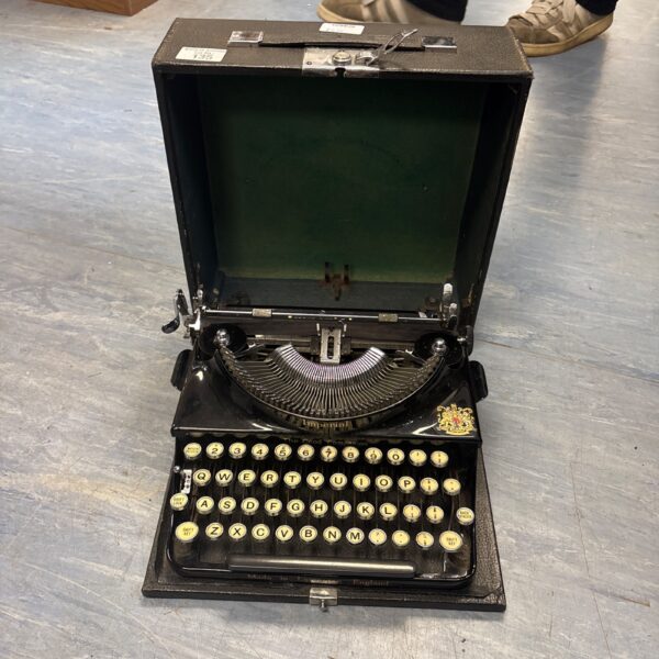 Vintage Imperial typewriter in its original carrying case.