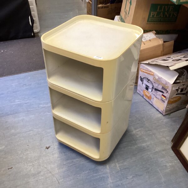 Vintage Kartell storage unit on wheels, mid century modern design.