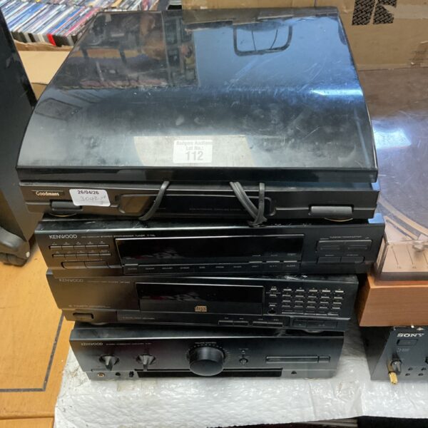 Vintage Kenwood stereo system with receiver, cassette, and CD player.