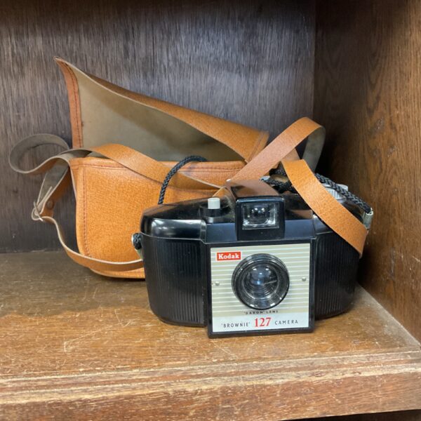 Vintage Kodak Brownie 127 camera with carrying case.