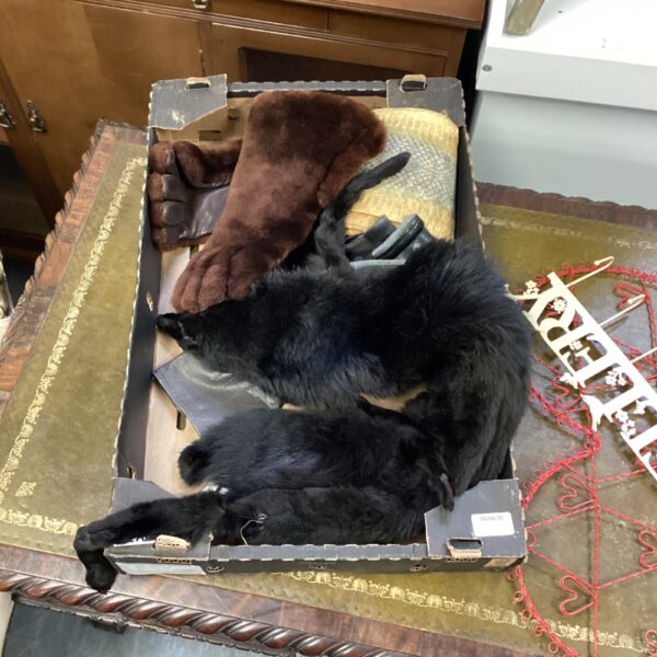 Dark vintage leather gloves with fur and snakeskin cuffs.
