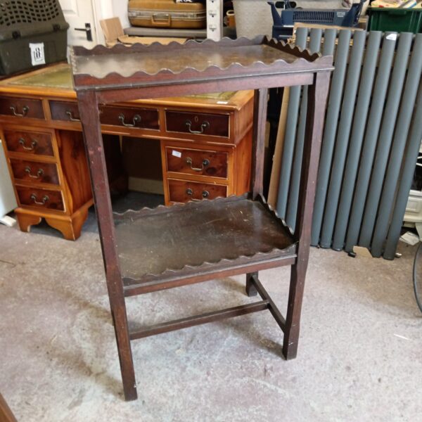 Vintage mahogany wash stand with lift-top and shelf.