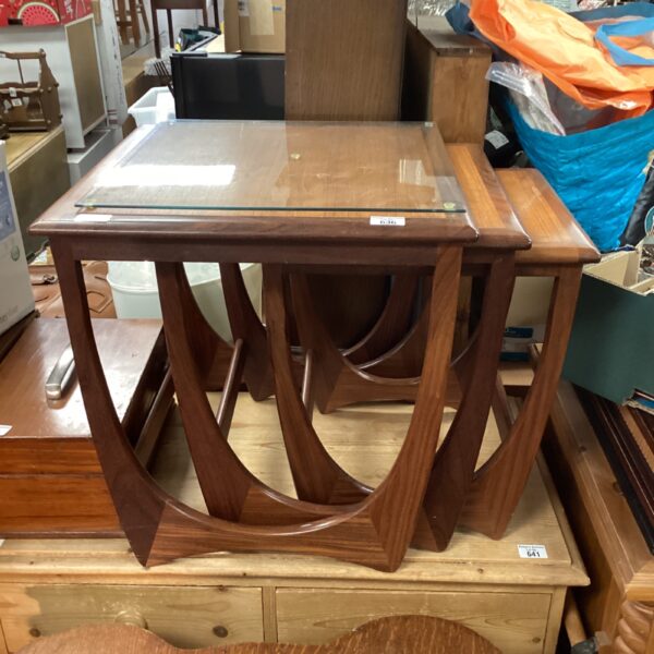 Vintage mid-century modern nest of tables with glass tops.