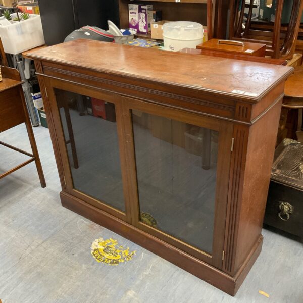 Vintage oak glazed bookcase with a classic design.
