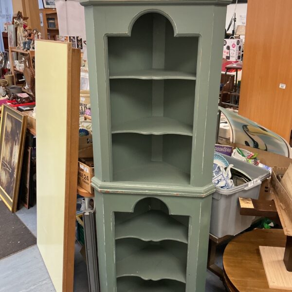 Vintage painted corner cabinet with open shelving for display.