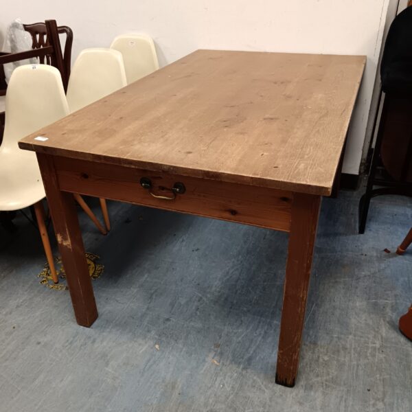 Vintage pine kitchen table with drawer, farmhouse style.