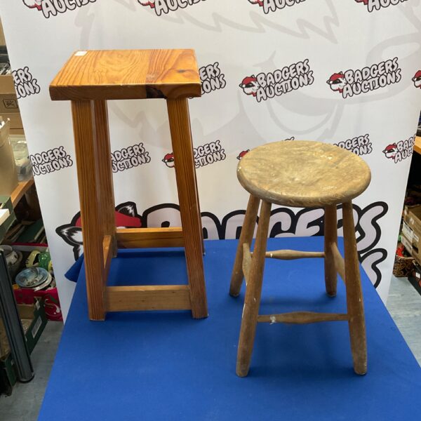 Rustic vintage pine stool with round seat and sturdy legs.
