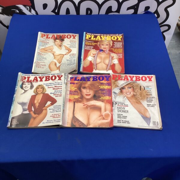 Vintage bundle of Playboy magazines, collectible men's publications.
