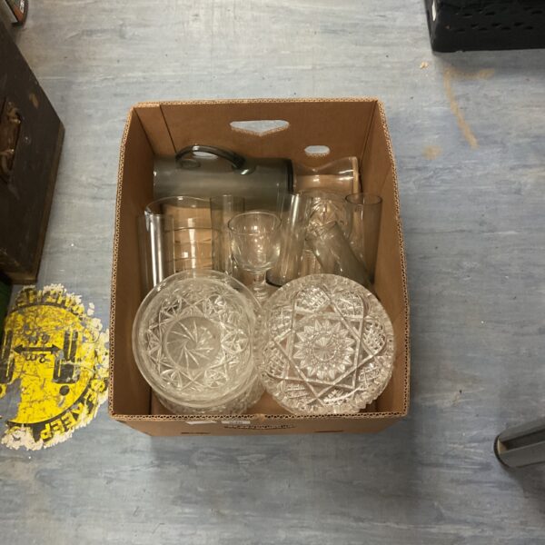 Vintage pressed glass collection with clear patterned dishes and glassware.