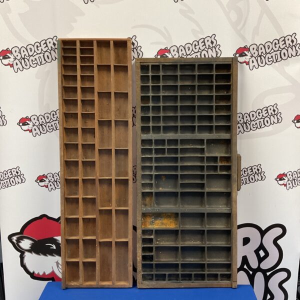 Vintage wooden printers block trays for letterpress typesetting.