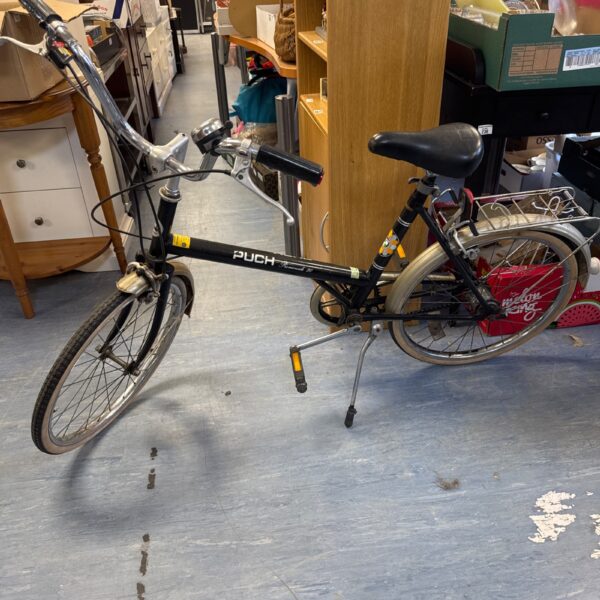 Vintage Puch Promenade 20 bicycle in need of restoration.