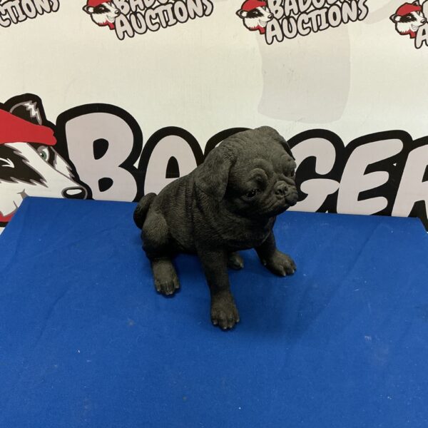 Vintage pug dog figurine, a charming collectible for home decor.