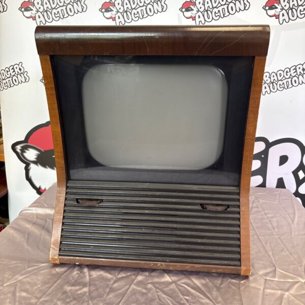Front view of a vintage PYE television with wooden cabinet.