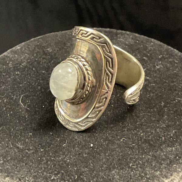 Vintage silver cuff ring with rainbow moonstone cabochon.
