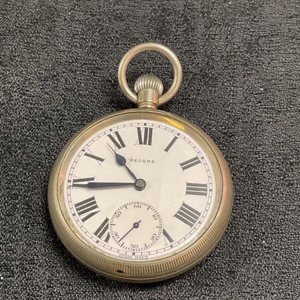 Vintage Record railway pocket watch with white dial.