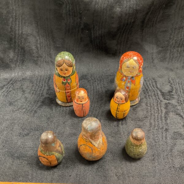 Vintage Russian dolls and weighted dolls, collectible Matryoshka dolls.