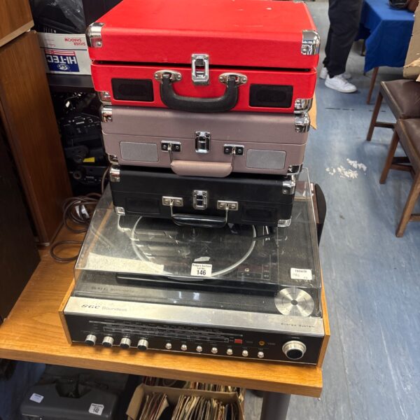 Vintage SGC Soundeck stereo system with portable record players.