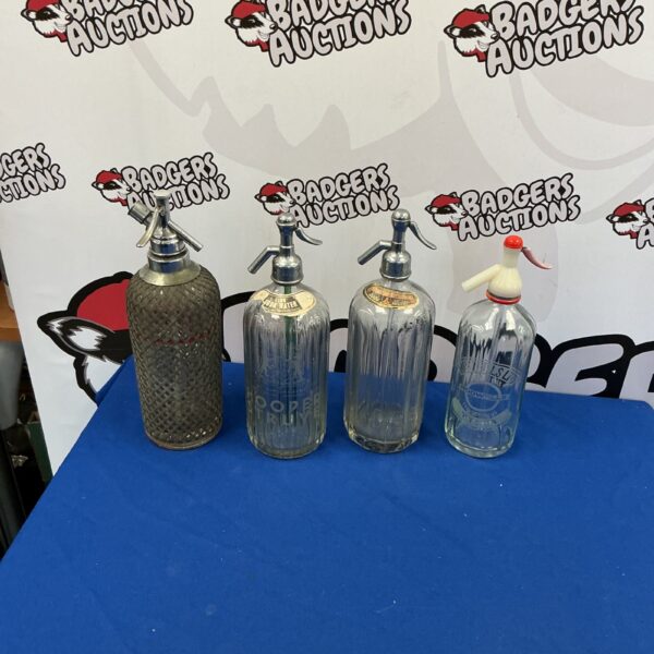 Lot of four vintage Sida syphons, antique soda bottles.