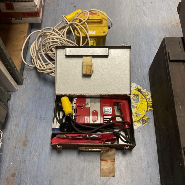 Vintage metal case housing a portable 110v site transformer.