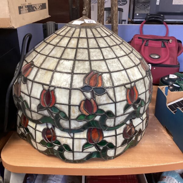Vintage stained glass lampshade with floral design.