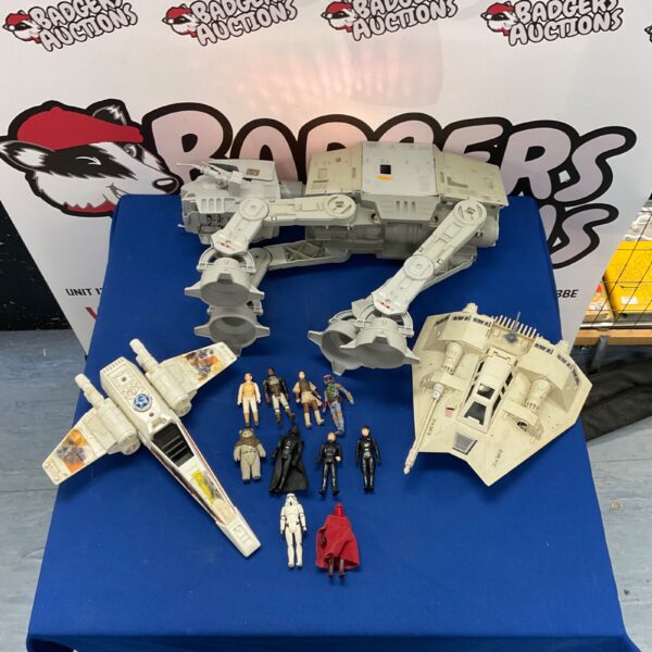 Vintage Star Wars toy lot featuring X-Wing and AT-AT.