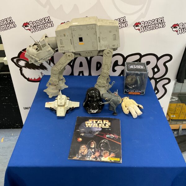 Vintage Star Wars toys lot including AT-AT and Darth Vader bank.
