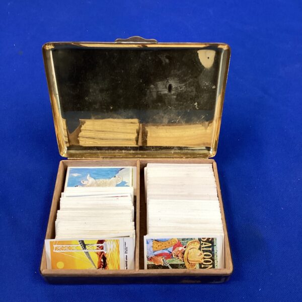 Vintage brass State Express cigarette box with cards inside.