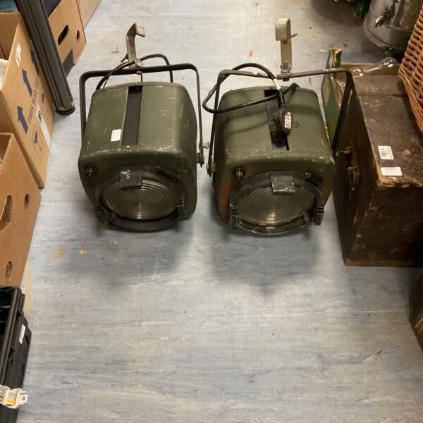Pair of vintage Strand Patt 223 theatre spotlights with patina.