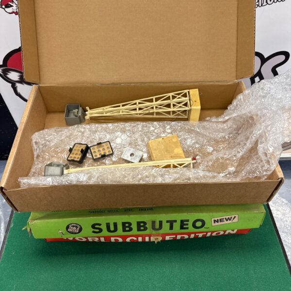 Open box showing vintage Subbuteo World Cup Edition set contents.