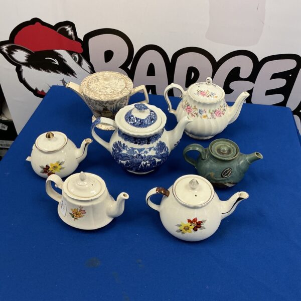 Collection of vintage tea pots from Adam’s and Gibson Pottery.