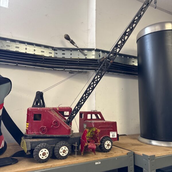 Side view of vintage tin plate crane truck with number 931.
