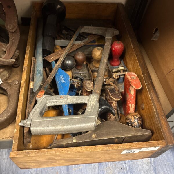 Vintage tool lot with various planes and hand tools.
