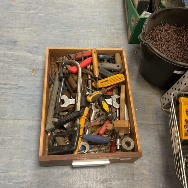 Assortment of vintage hand tools in a metal tray.