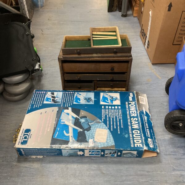 Vintage wooden engineer's toolbox with a TLC power saw guide inside.