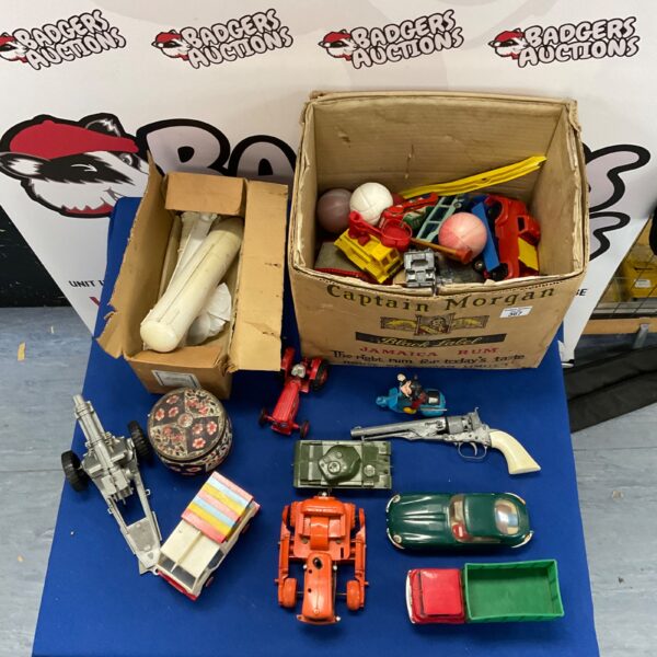 Vintage toy lot with Tri-ang vehicles and assorted playthings.