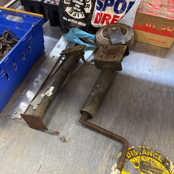 Vintage trailer jockey wheel and stabiliser for caravan use.