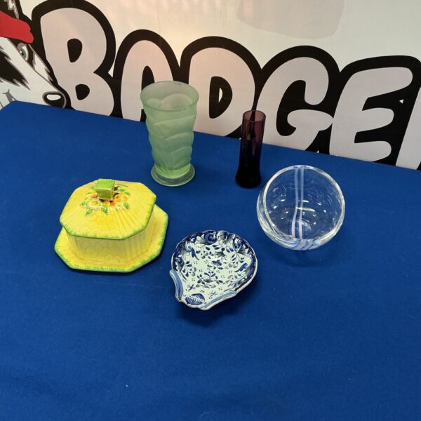Vintage trinket collection featuring Caithness glass and a yellow box.