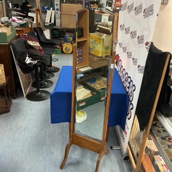 Vintage Tripps full length mirror with dark wooden frame.