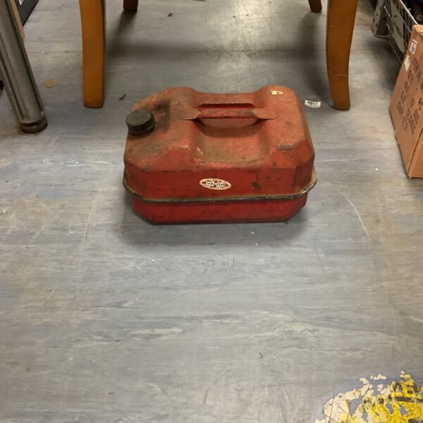 Red vintage Valour petrol can, a classic collectable fuel container.